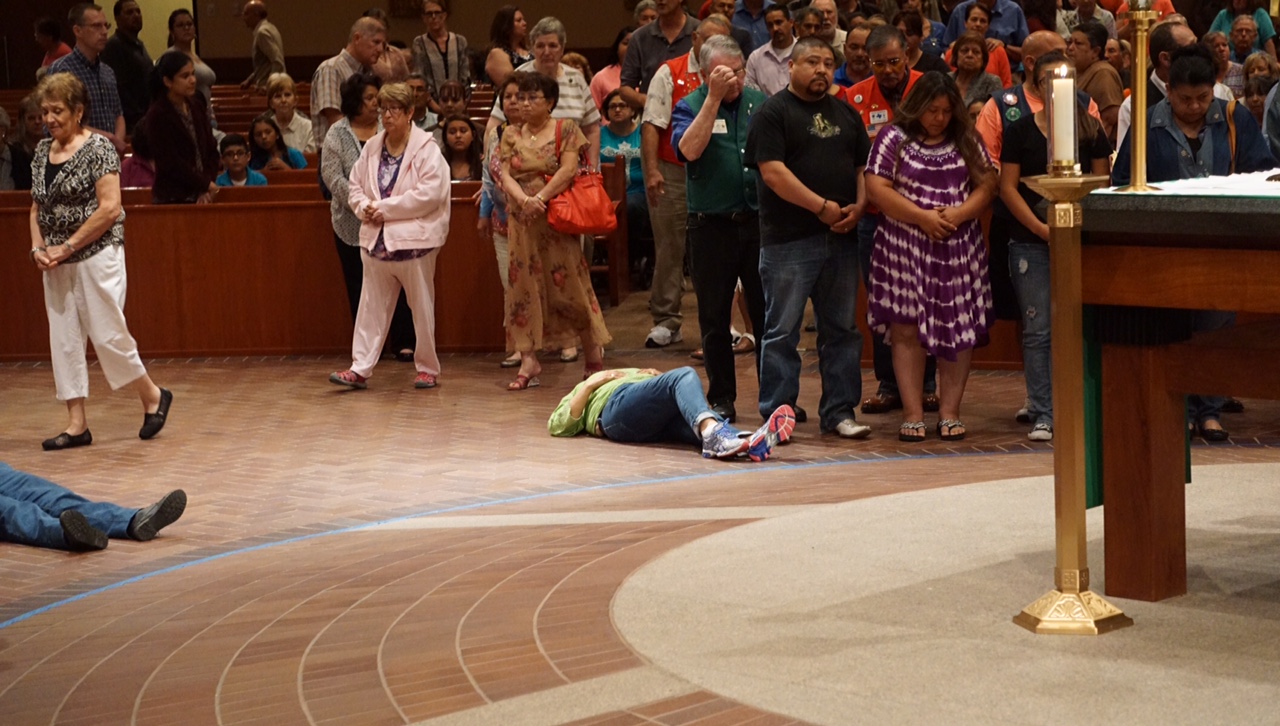 Overwhelmed by emotion, some of those seeking healing fell to the floor. (LIVE! Photo/John Basquez)