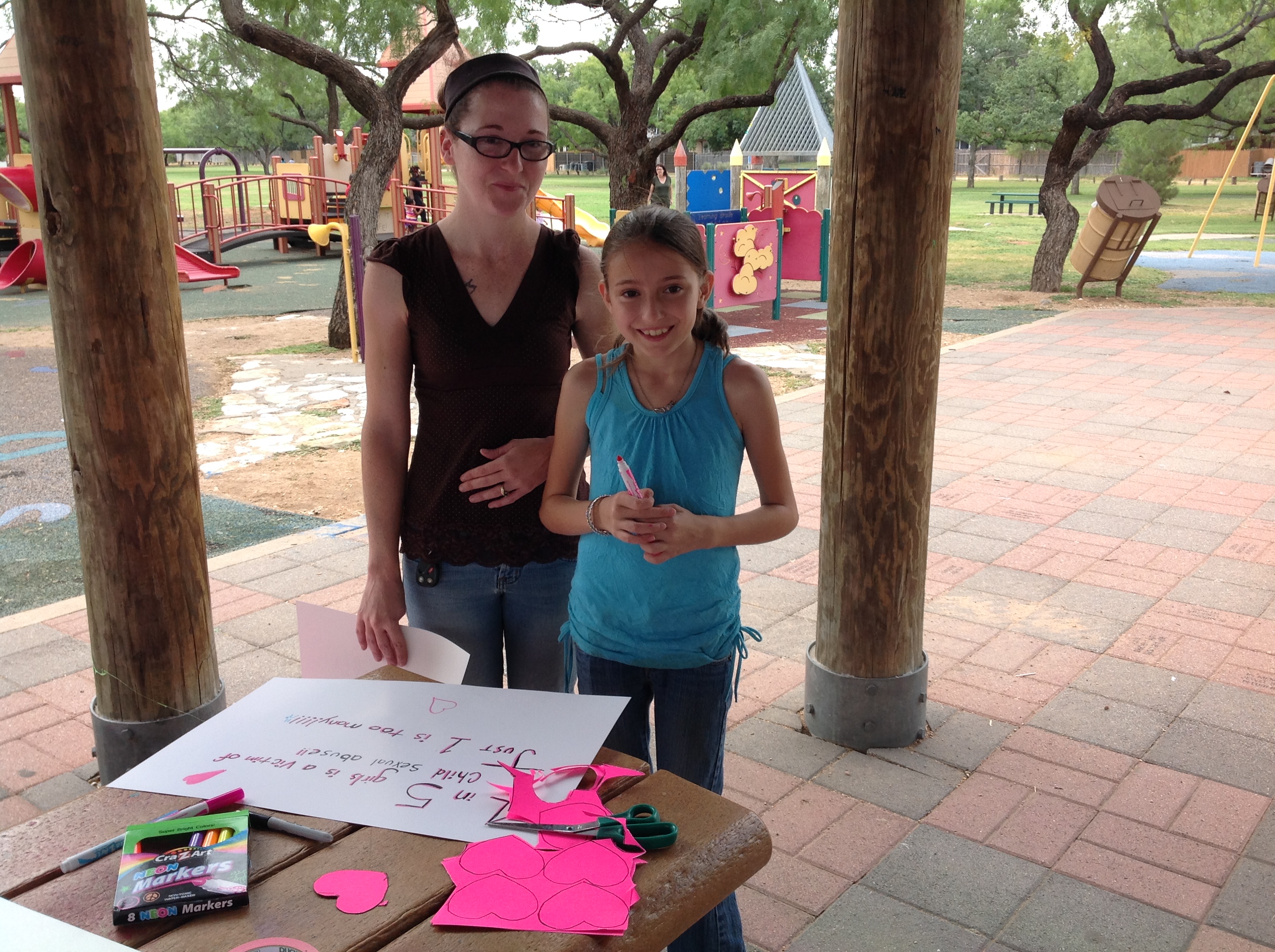 Amanda and Elizabeth Groover went to the Rally for Annabelle Saturday at Unidad Park to help make posters for Monday's protest.(LIVE! Photo\Brandy Rae Ramirez) Amanda and Elizabeth Groover went to the Rally for Annabelle Saturday at Unidad Park to help make posters for Monday's protest.(LIVE! Photo\Brandy Rae Ramirez)
