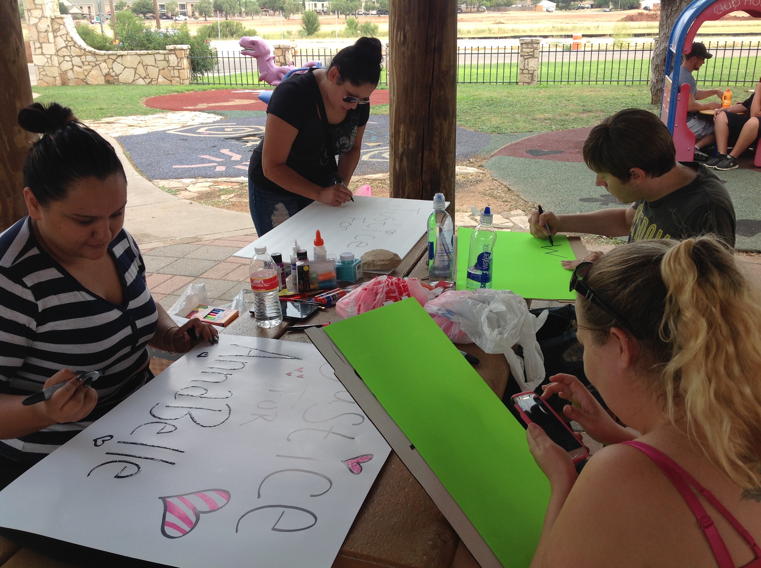 Erika Gonzales, Tasha Muñoz, Justin Norwood and Crystan Jacques work together to make posters for Monday's "Justice for Annabelle Protest" downtown.(LIVE! Photo\Brandy Rae Ramirez) Erika Gonzales, Tasha Muñoz, Justin Norwood and Crystan Jacques work together to make posters for Monday's "Justice for Annabelle Protest" downtown.(LIVE! Photo\Brandy Rae Ramirez)