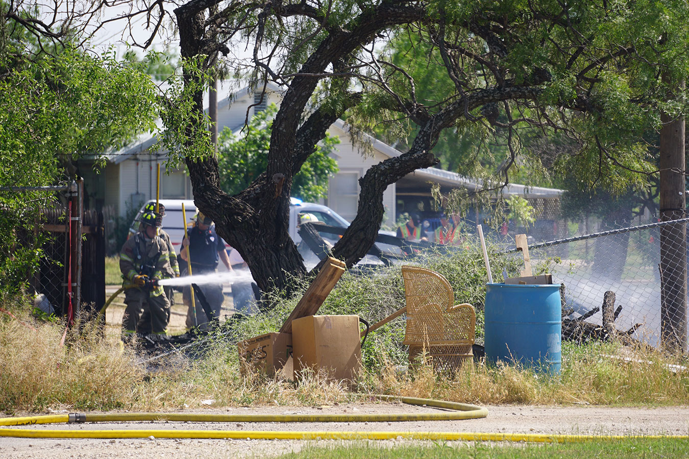 A shed burned down in the backyard of a residence near Wade and 18th Streets Saturday, May 9, 2015. (LIVE! Photo/Megan Holmquest)