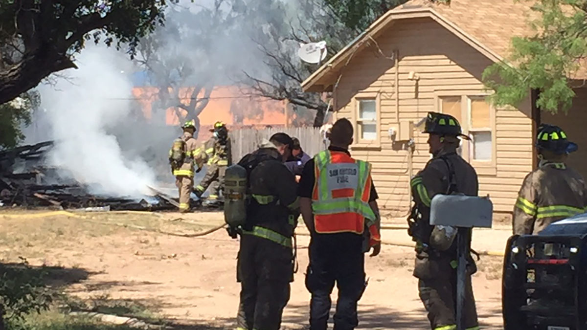 A shed burned down in the backyard of a residence near Wade and 18th Streets Saturday, May 9, 2015. (LIVE! Photo/Megan Holmquest)