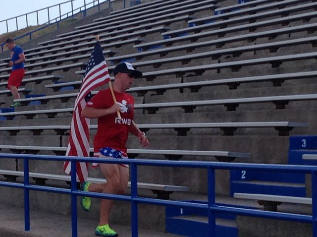 U.S. Marine Core Tyler Gile lead The RWB 9/11 Memorial Climb with the U.S. flag in hand Wednesday at the San Angelo Stadium.(LIVE! Photo\Brandy Rae Ramirez) U.S. Marine Core Tyler Gile lead The RWB 9/11 Memorial Climb with the U.S. flag in hand Wednesday at the San Angelo Stadium.(LIVE! Photo\Brandy Rae Ramirez)