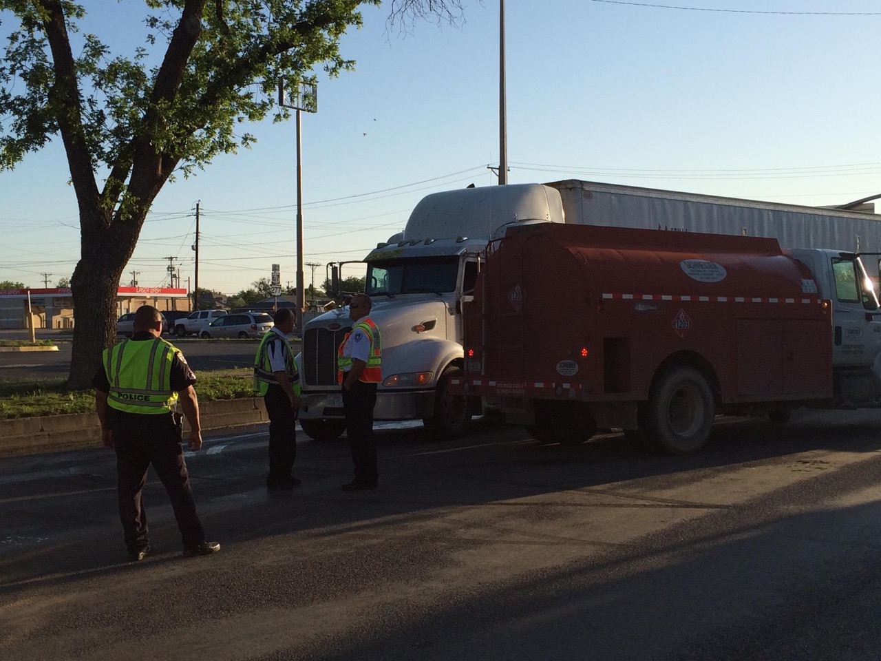 A truck from Schneider Distributing was found that could drain the remaining fuel from the semi&amp;#039;s tank before all of it spilled onto the roadway. (LIVE! Photo/John Basquez)