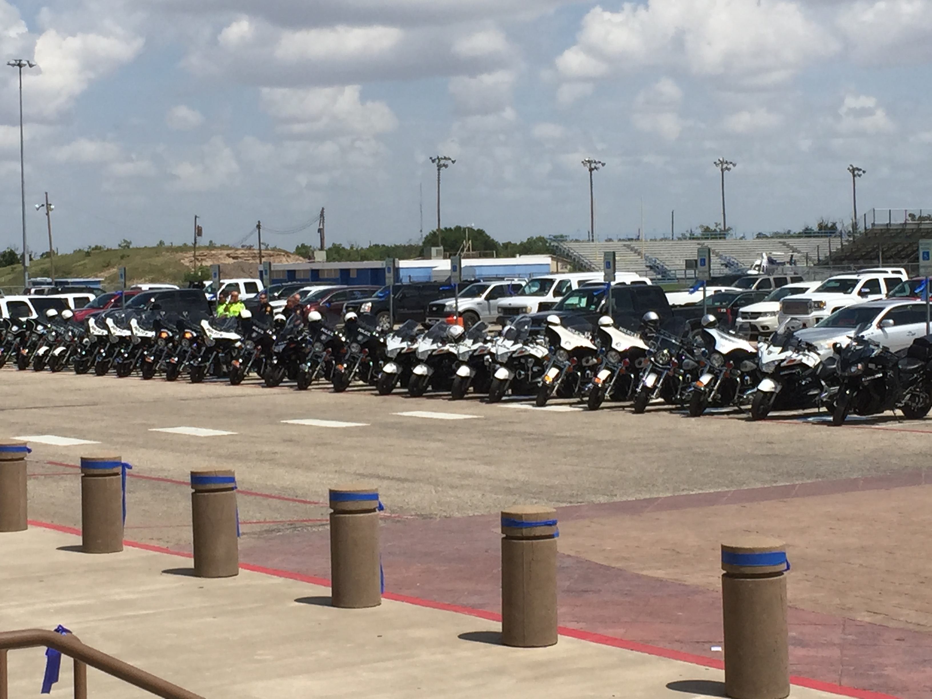 Police motorcycles from law enforcement agencies all over the state of Texas were parked in front of the coliseum Monday. (LIVE! Photo/Joe Hyde)