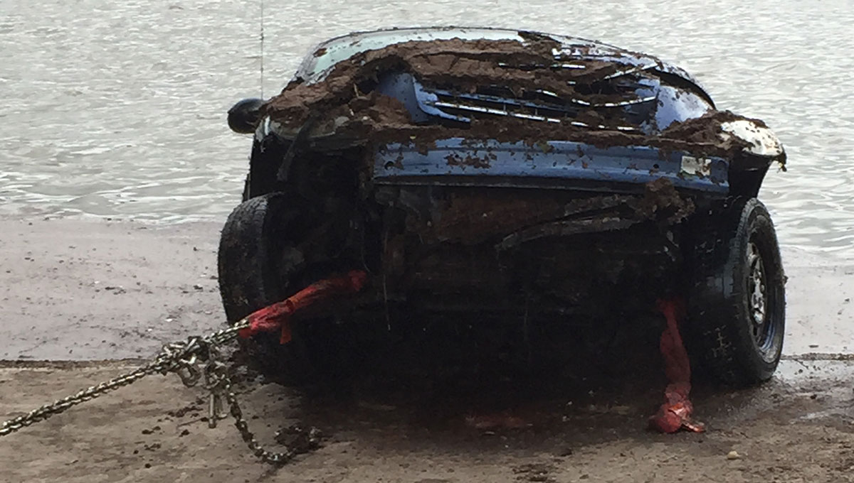 Pulling the PT Cruiser out of the lake. (LIVE! Photo/Megan Holmquest) Pulling the PT Cruiser out of the lake. (LIVE! Photo/Megan Holmquest)
