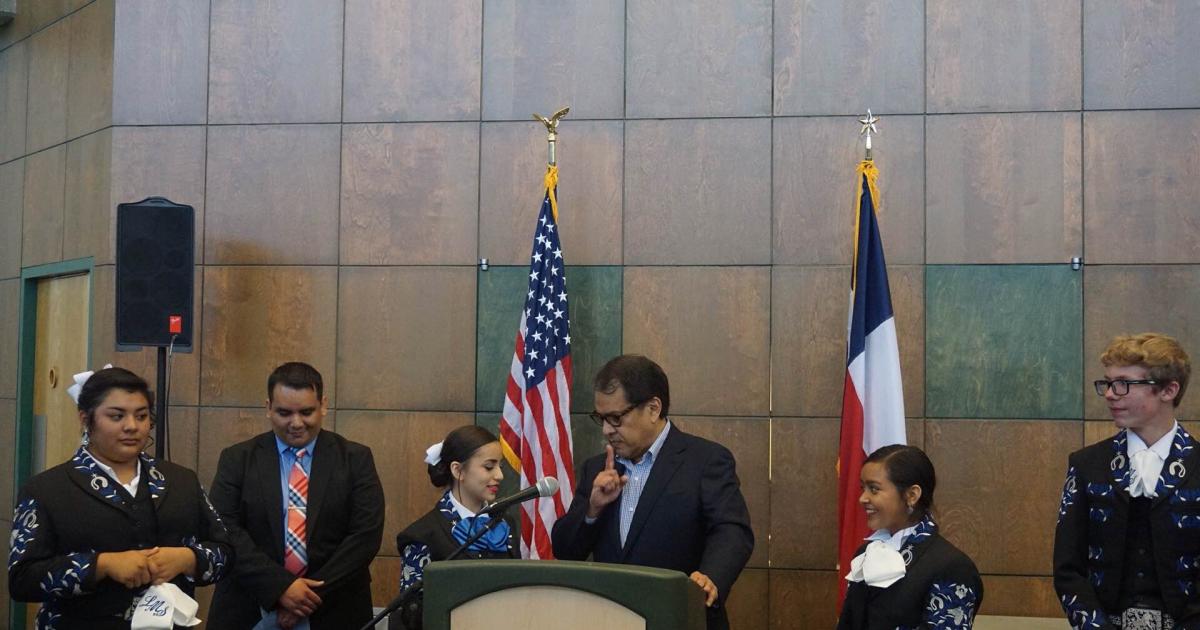 Perez receives check from Castillo
