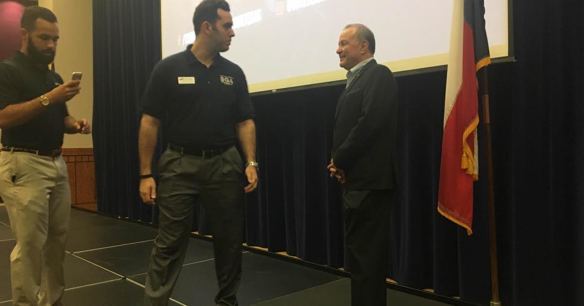 Sec. Cascos talking to students after the presentation.