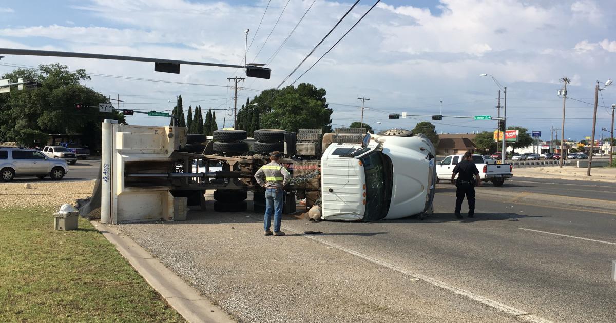 A dump truck tips over on Knickerbocker and Johnson. (LIVE! Photo/Stephanie Lindgren) A dump truck tips over on Knickerbocker and Johnson. (LIVE! Photo/Stephanie Lindgren)