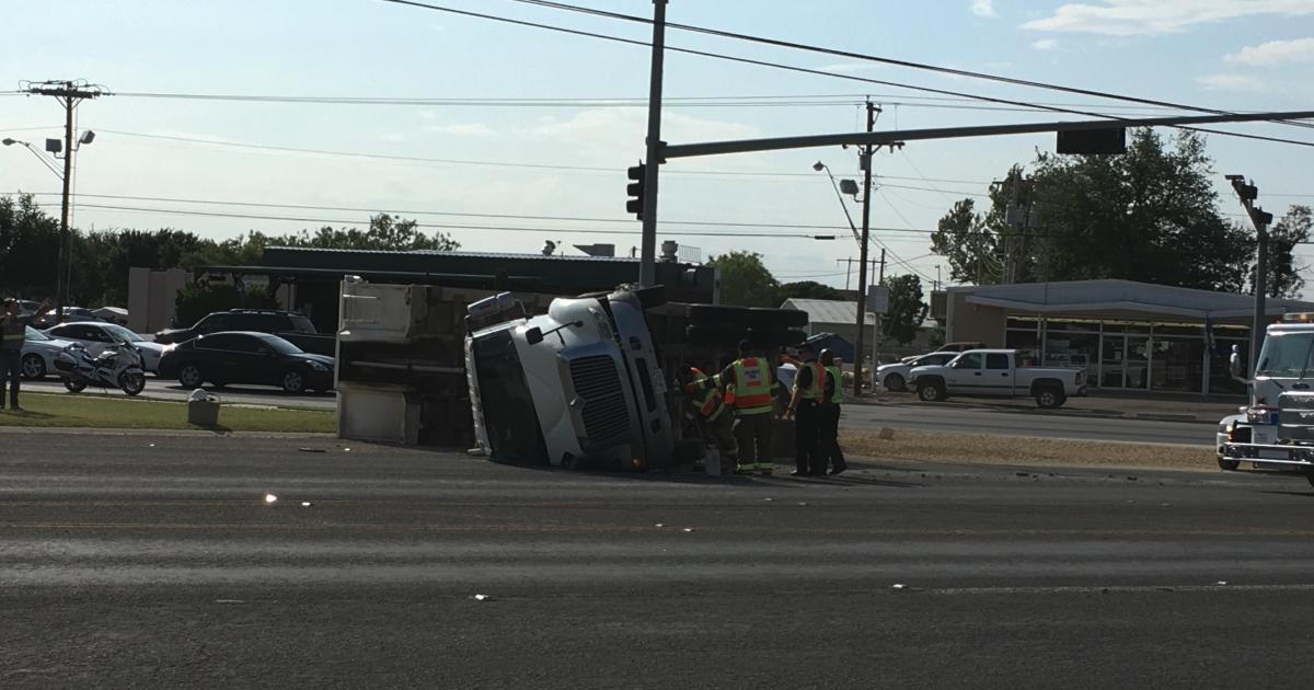 A dump truck tips over on Knickerbocker and Johnson. (LIVE! Photo/Stephanie Lindgren) A dump truck tips over on Knickerbocker and Johnson. (LIVE! Photo/Stephanie Lindgren)