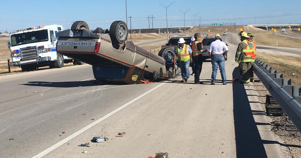 A teenager flips his truck on Houston Harte. (LIVE! Photo/Stephanie Lindgren)