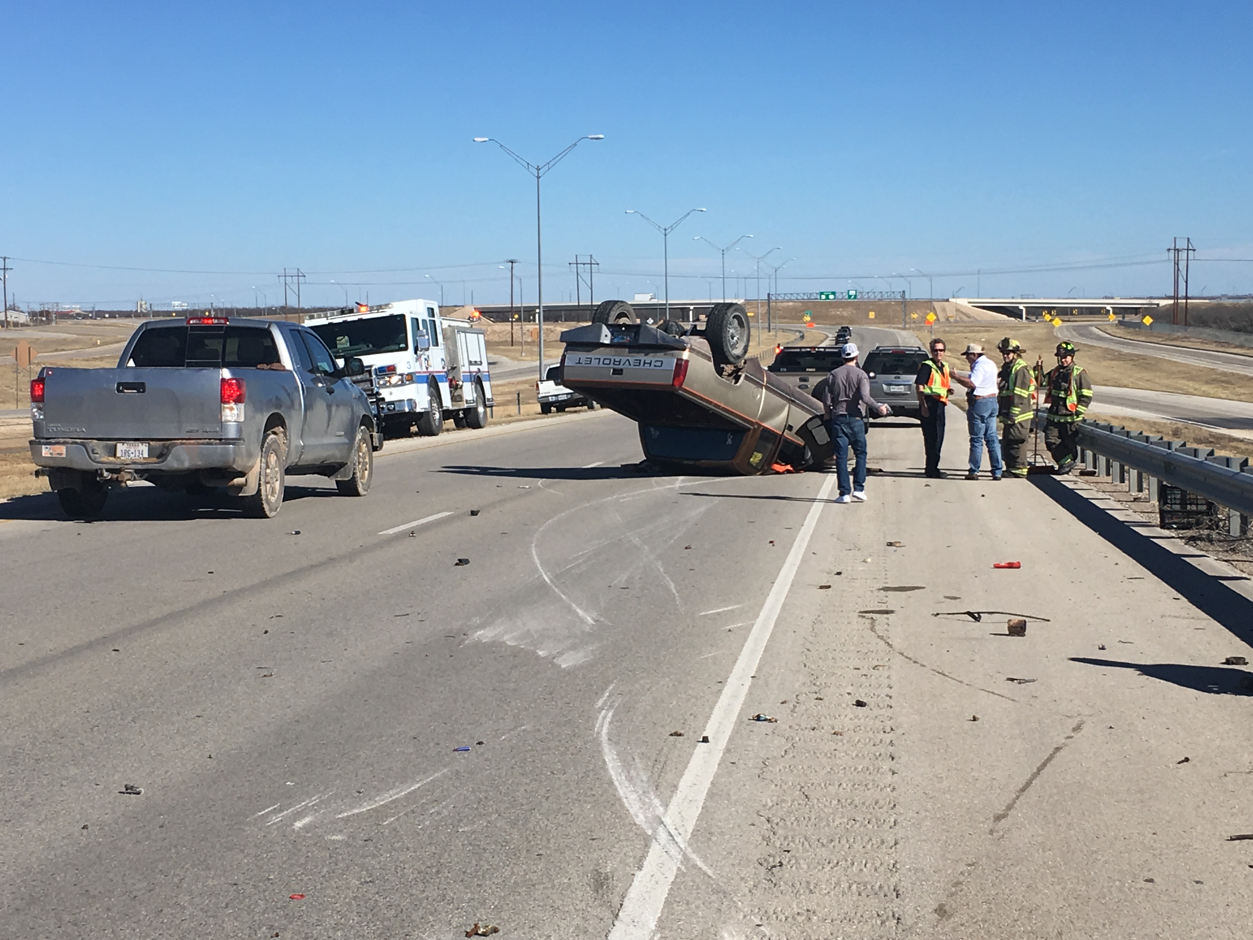 A teenager flips his truck on Houston Harte. (LIVE! Photo/Stephanie Lindgren)