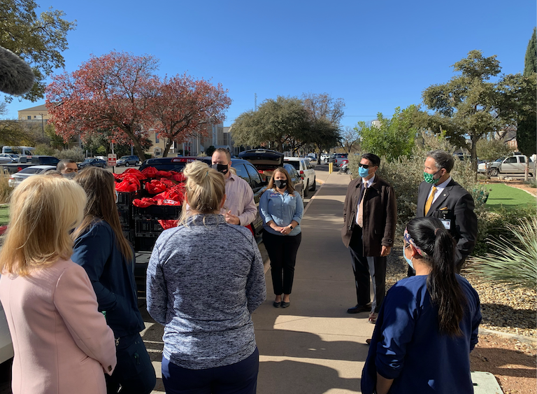 H-E-B's Nick George Giving Donation of 850 Goodie Bags