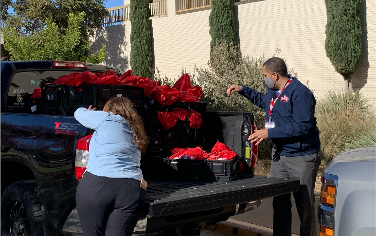 Unloading 850 Goodie Bags from H-E-B