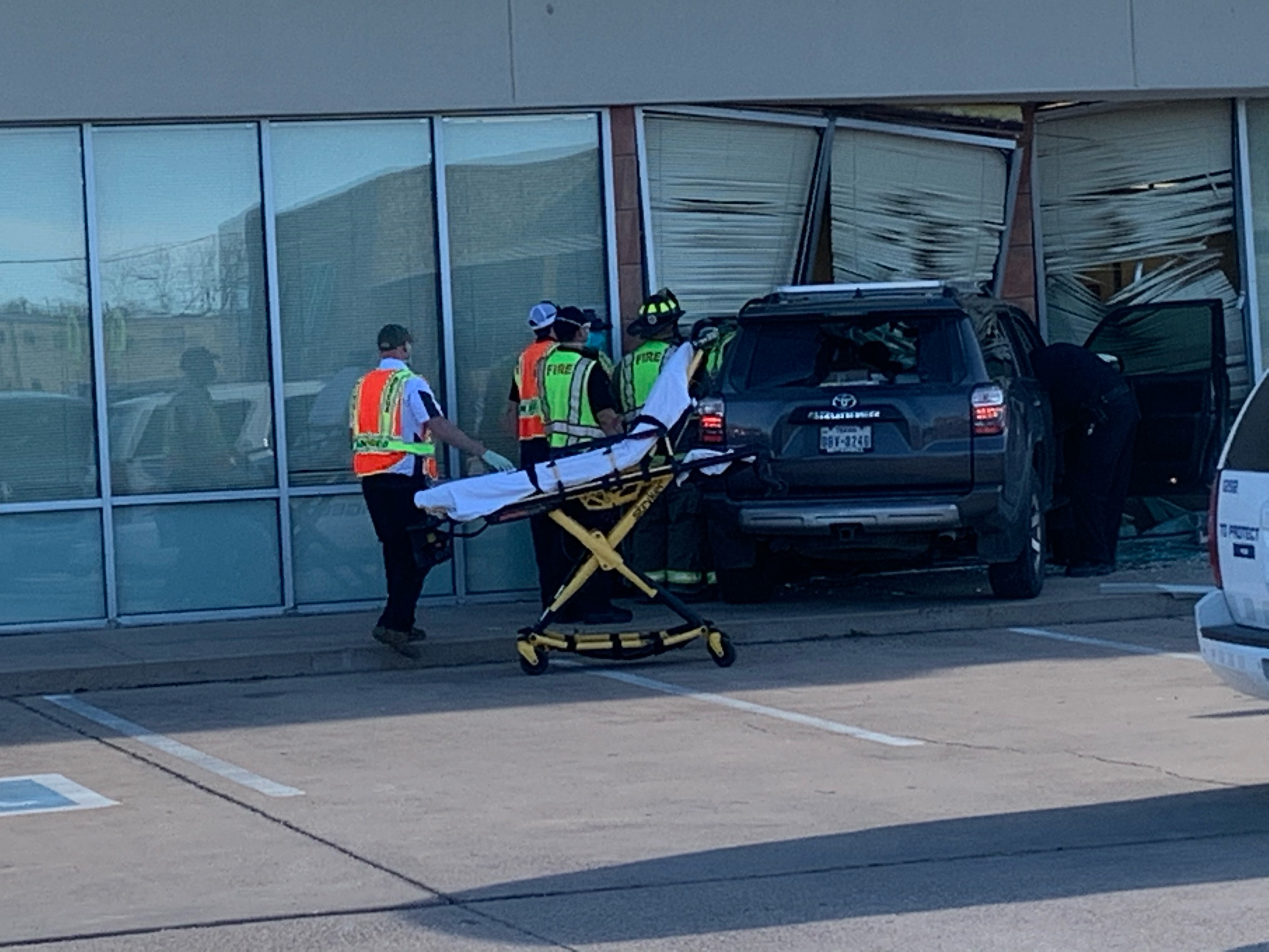 Woman Transported to the Hospital After Crashing Into Calling Center (Live Photo / Matt Trammell)