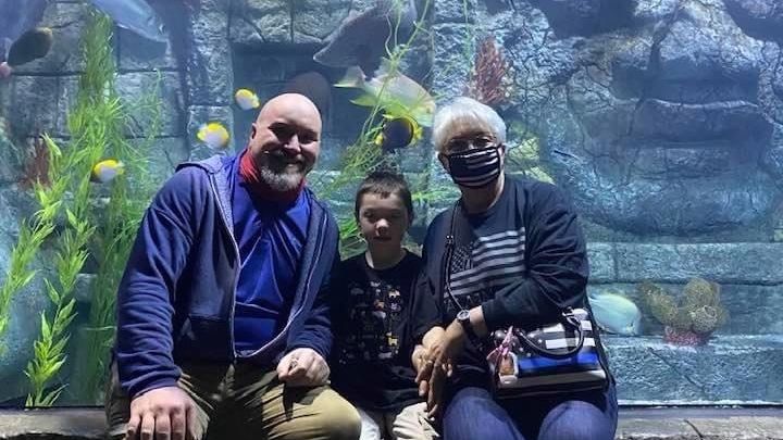 Cathy Delaughter (right) with her son and grandson who lived with her in Sherwood