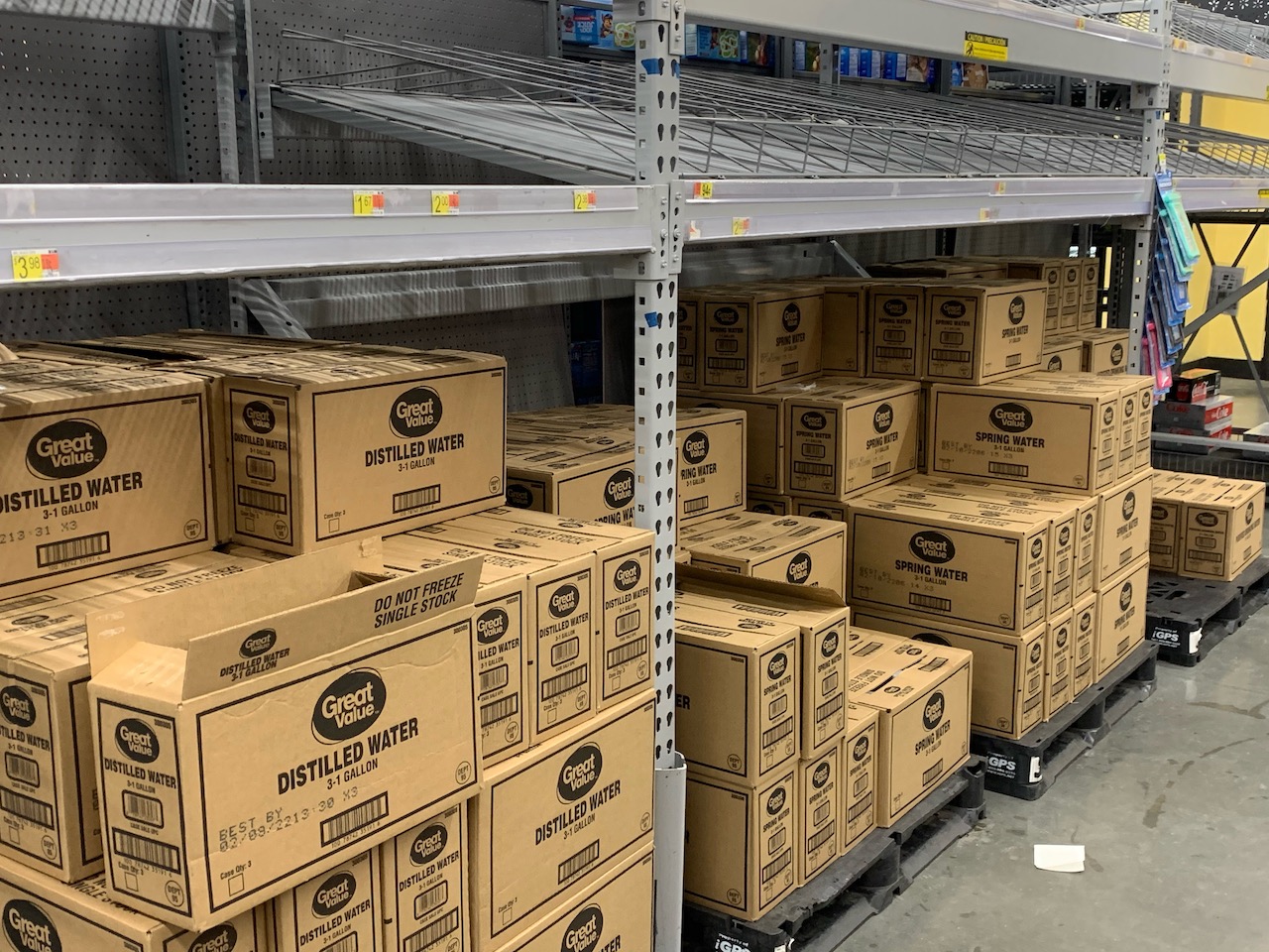 Cases of gallon jug water available at Walmart Neighborhood Market on Sherwood Way