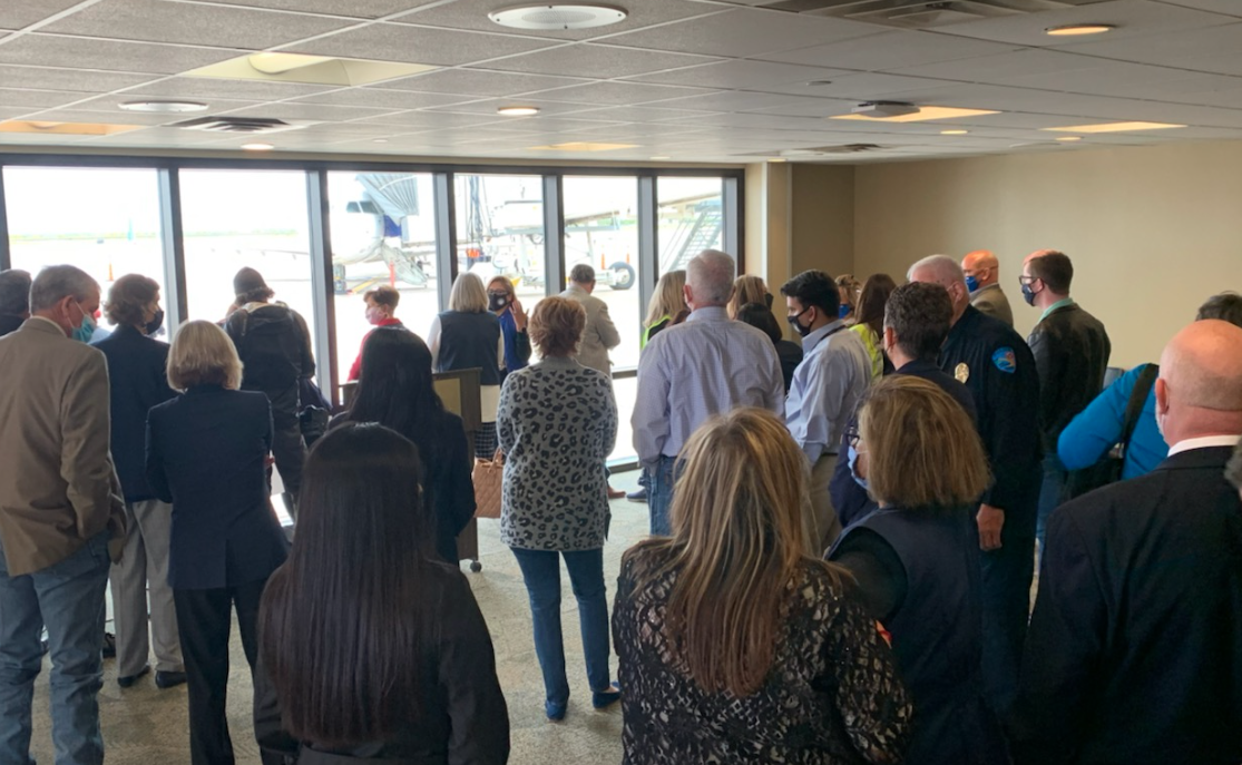 Crowds Gathering During the Inaugural Flight From Houston Lands in San Angelo