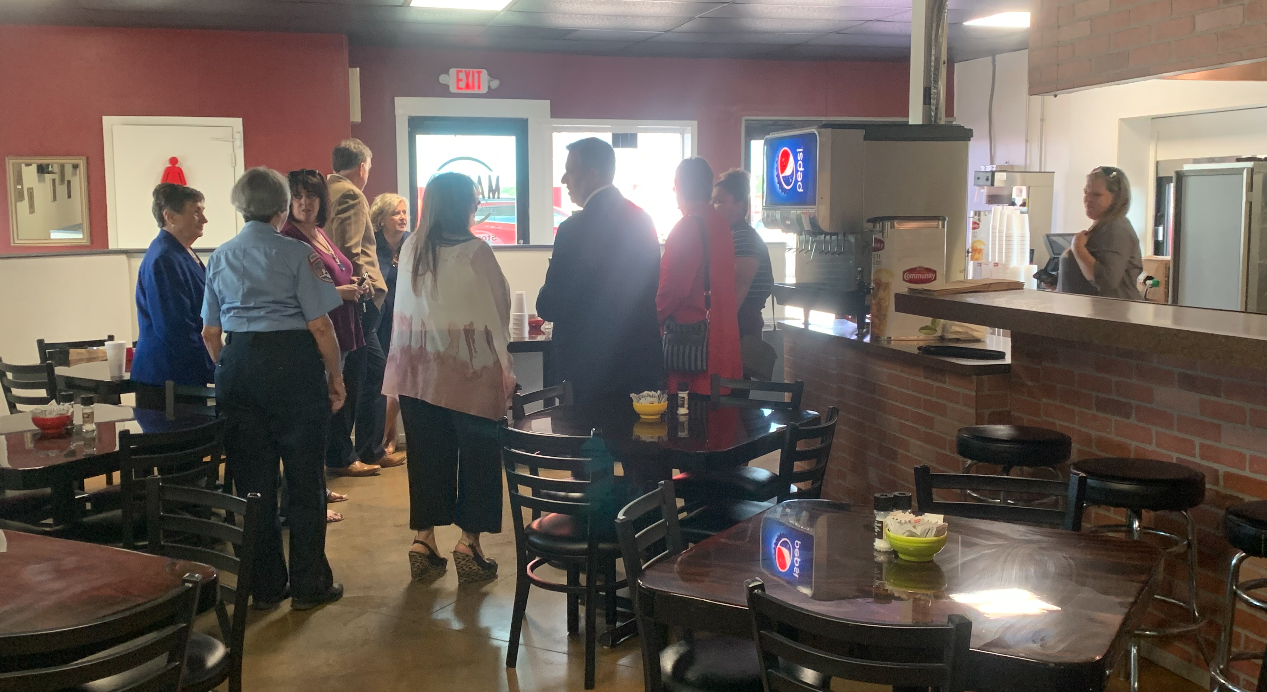 Chamber of Commerce Members Including Cadres Mingling at Mamma Changs' Ribbon Cutting