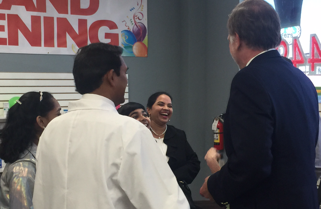 Walt Koenig and the Vukoti's Celebrating The Grand Opening of Angelo Pharmacy