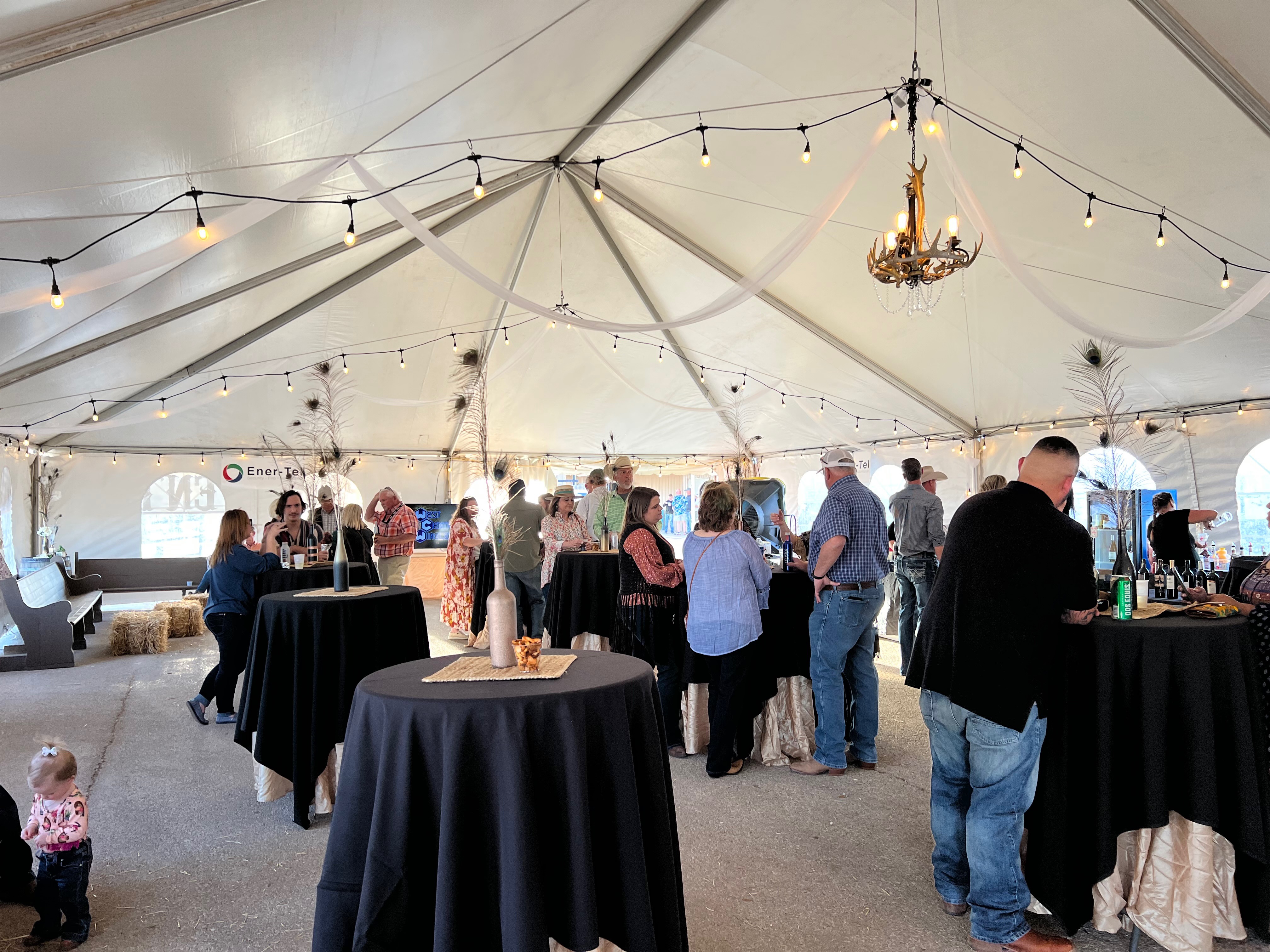 Meeting friends inside the 2022 San Angelo Rodeo wine tent Meeting friends inside the 2022 San Angelo Rodeo wine tent