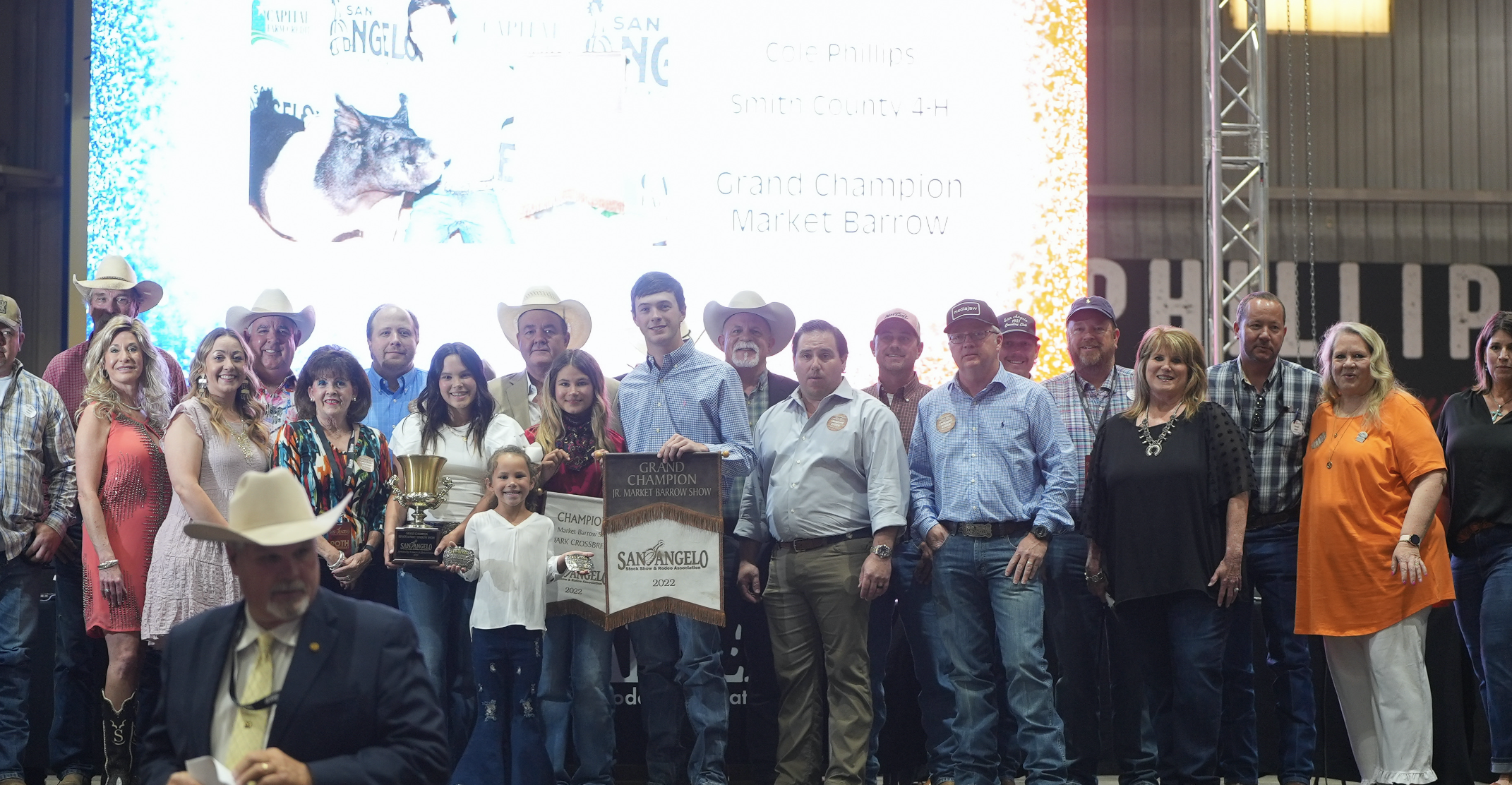 Cole Phillips, Smith County 4-H, Grand Champion Barrow Along with Group of Buyers Cole Phillips, Smith County 4-H, Grand Champion Barrow Along with Group of Buyers