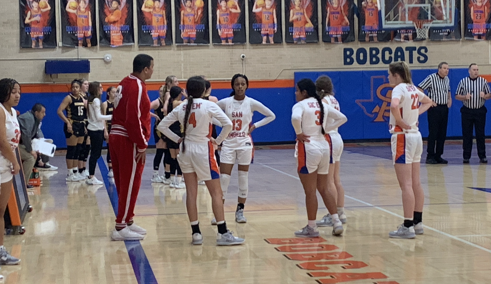 Lady Cats during a timeout Lady Cats during a timeout
