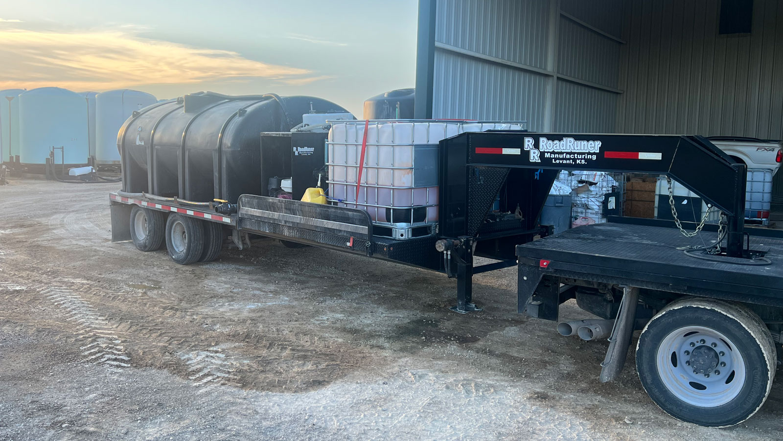 A 32-foot gooseneck trailer holding a 3,000-gallon water tank with a pumping system connected to it was still missing Wednesday night, May 10, 2023. There were two white totes full of herbicide on the front end of the trailer. A 32-foot gooseneck trailer holding a 3,000-gallon water tank with a pumping system connected to it was still missing Wednesday night, May 10, 2023. There were two white totes full of herbicide on the front end of the trailer.