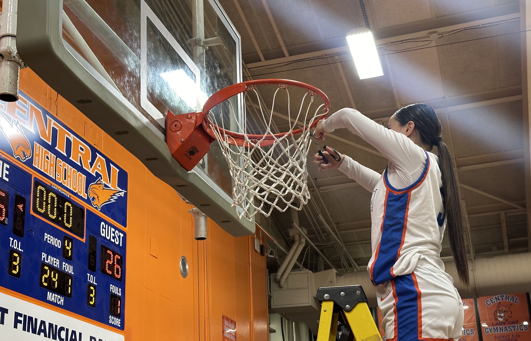 The Lady Cats cut down the nets after claiming the District 2-6A District Championship
