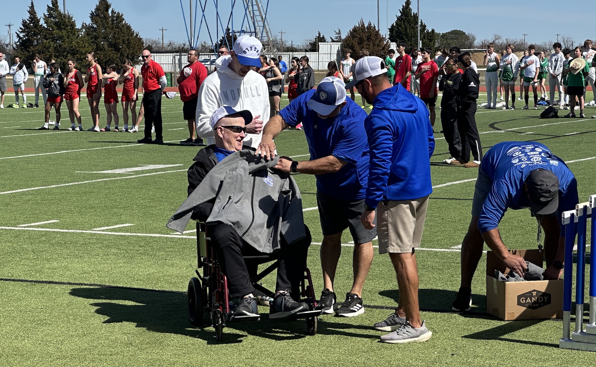 Lake View Coaches present Nat Sawyer with a commemorative jacket