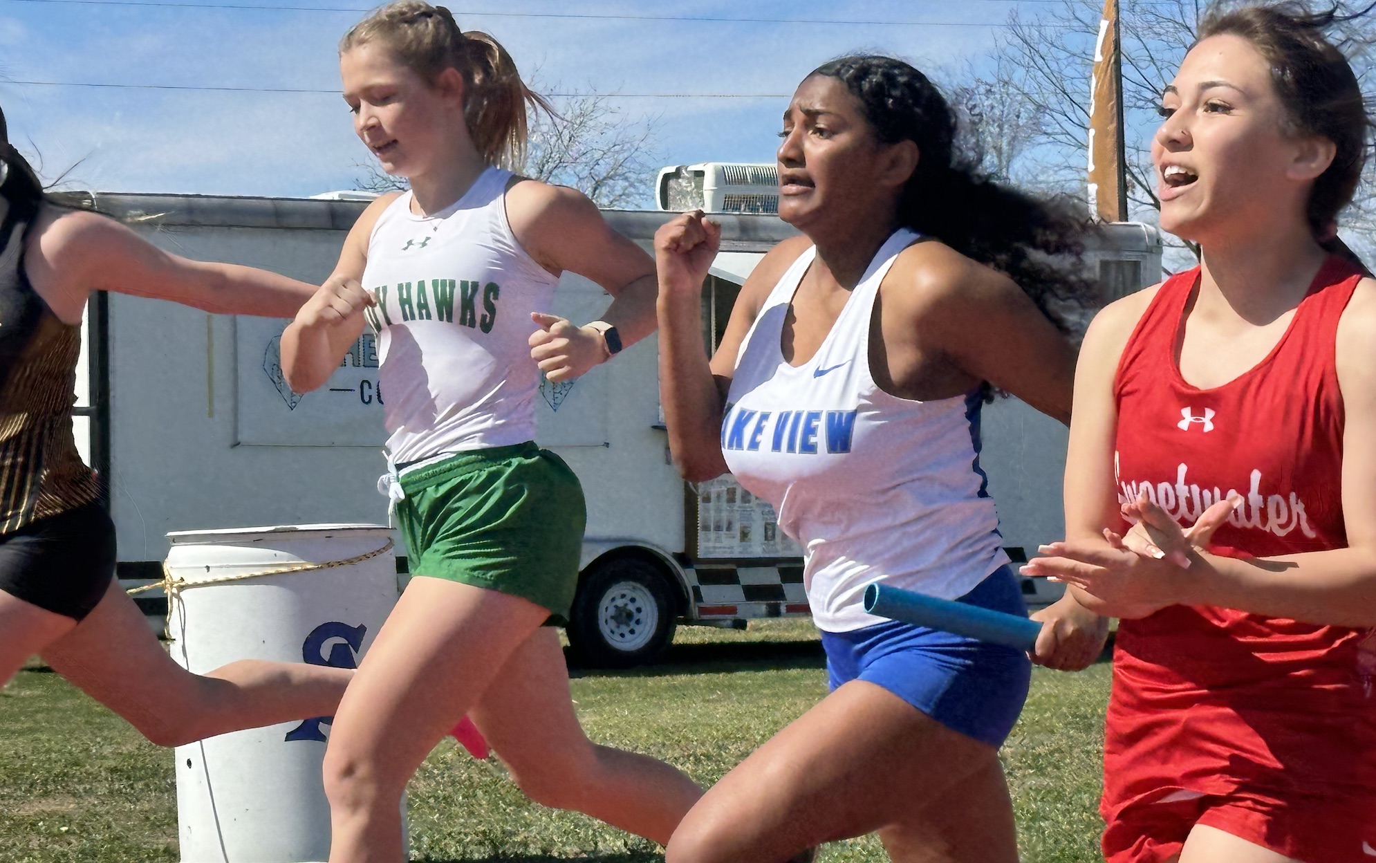 Ladies running the 4x100-meter relay