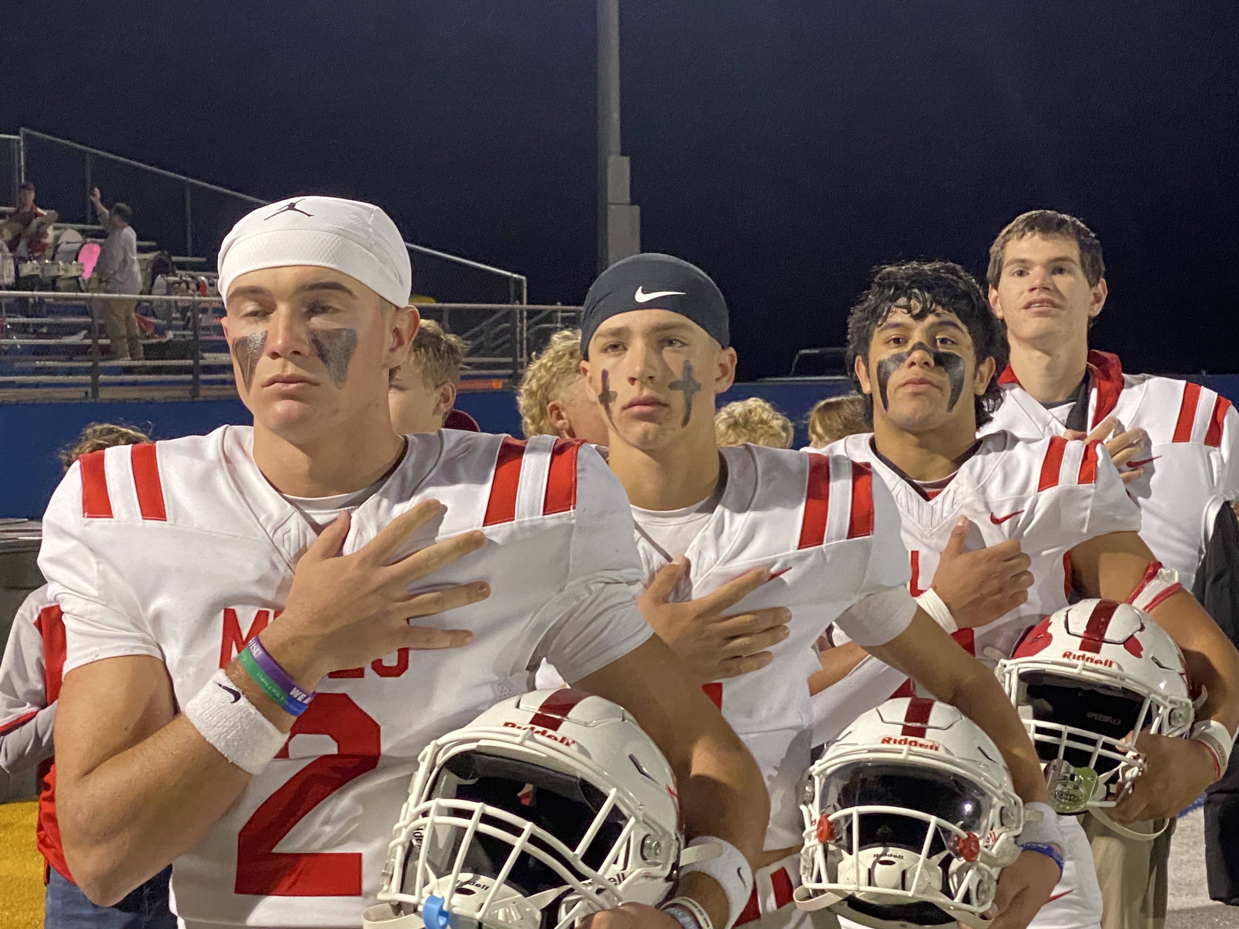 The Miles football team stands for the national anthem before its first-round playoff game against Lindsay in Brock on Thursday, Nov. 14, 2024. The Miles football team stands for the national anthem before its first-round playoff game against Lindsay in Brock on Thursday, Nov. 14, 2024.