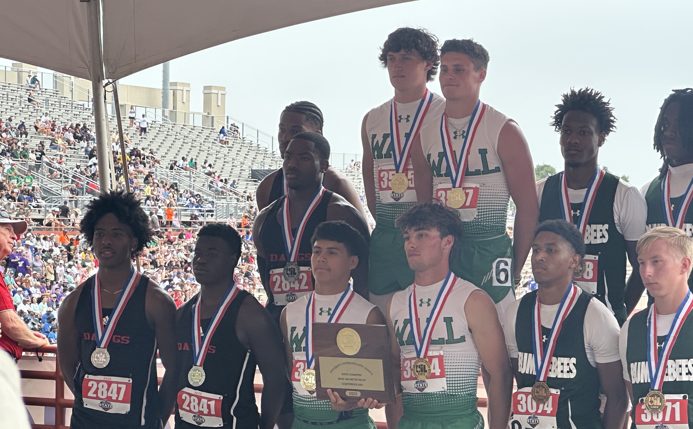 Wall Hawks Championship 4x200-meter Team (Evan Boehle, Ruben Marin, Hagynn Barbee, and Briggs Jones) Wall Hawks Championship 4x200-meter Team (Evan Boehle, Ruben Marin, Hagynn Barbee, and Briggs Jones)