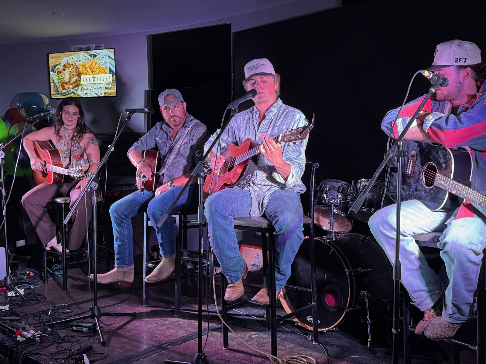 Headliners (L-R) Kat Hasty, Rich O'Toole, Cooper Hamilton (singing), and Sterling Elza. Headliners (L-R) Kat Hasty, Rich O'Toole, Cooper Hamilton (singing), and Sterling Elza.