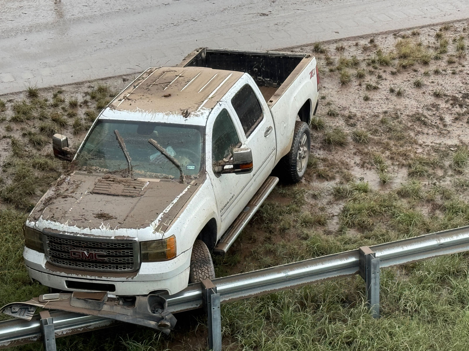 On the east side of the Bell Street overpass were more flooded cars revealed after the flood waters receded. On the east side of the Bell Street overpass were more flooded cars revealed after the flood waters receded.