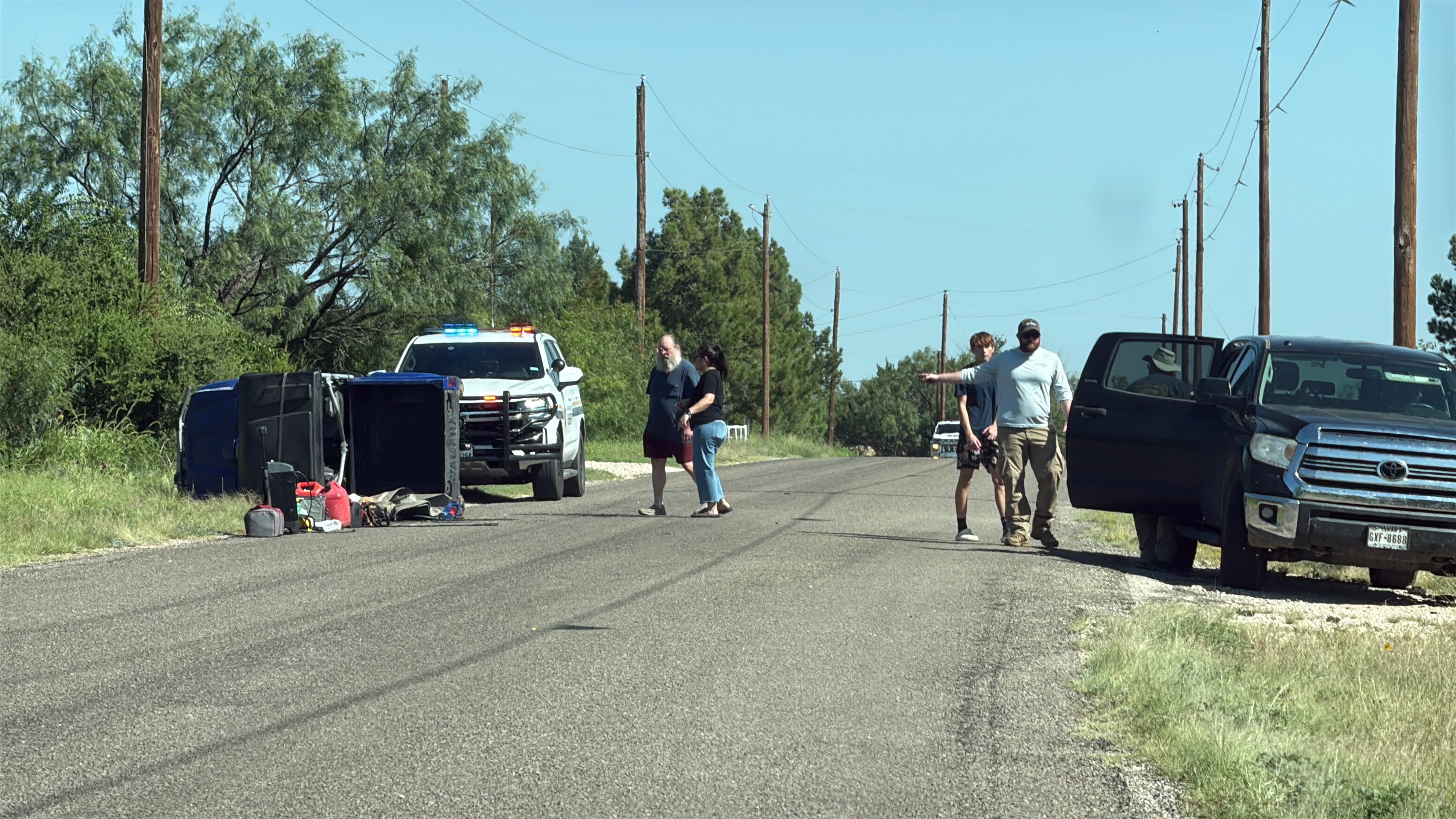 A utility vehicle is shown turned over on the side of the road after a manhunt in Dove Creek on Friday, July 25, 2025. A utility vehicle is shown turned over on the side of the road after a manhunt in Dove Creek on Friday, July 25, 2025.