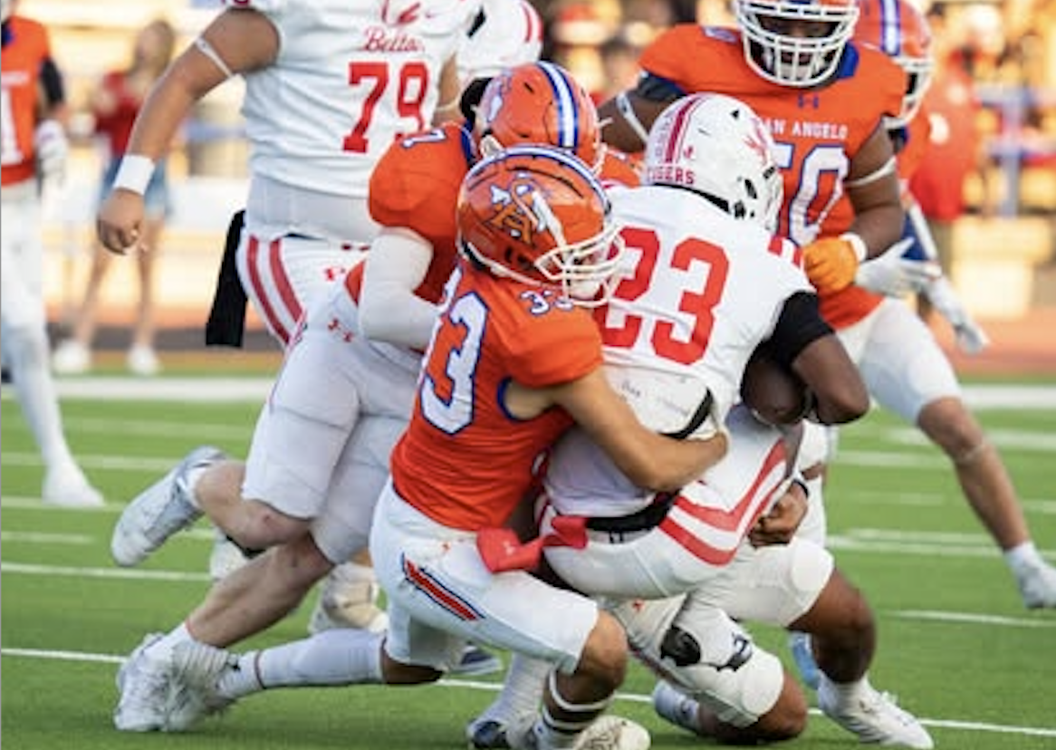 Mason Van Sickle (7) and Luisangel Garcia (33) combine for a tackle against Odessa High in their 2024 game at San Angelo Stadium. Mason Van Sickle (7) and Luisangel Garcia (33) combine for a tackle against Odessa High in their 2024 game at San Angelo Stadium.