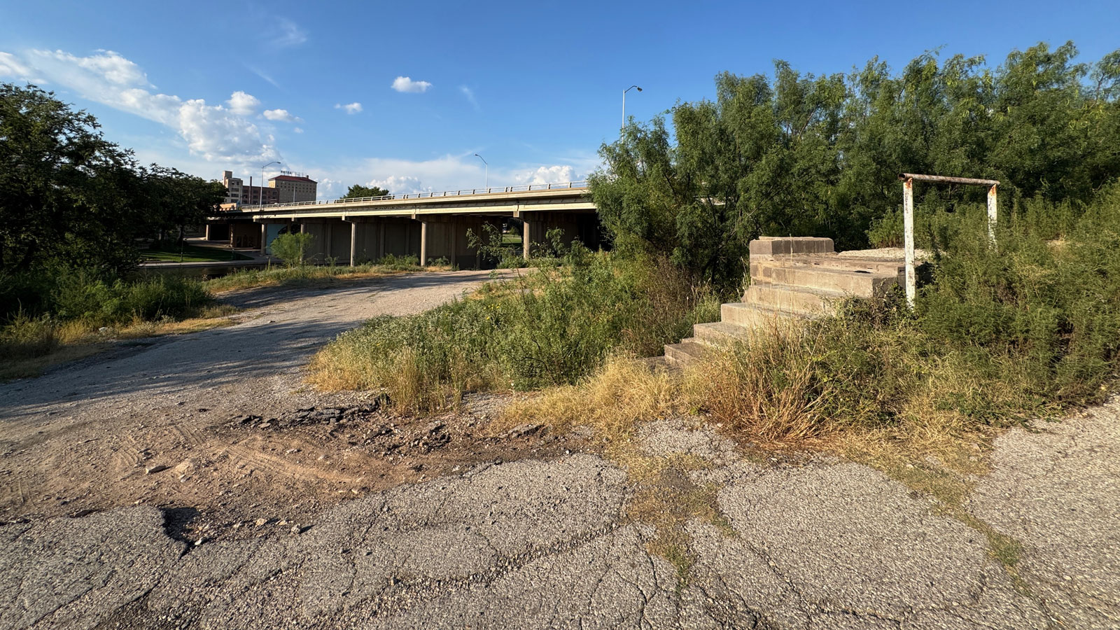 Ruins from the Beaver Lodge Motel, such as this staircase and dilapidated parking lot pavement, are still on the property. Ruins from the Beaver Lodge Motel, such as this staircase and dilapidated parking lot pavement, are still on the property.