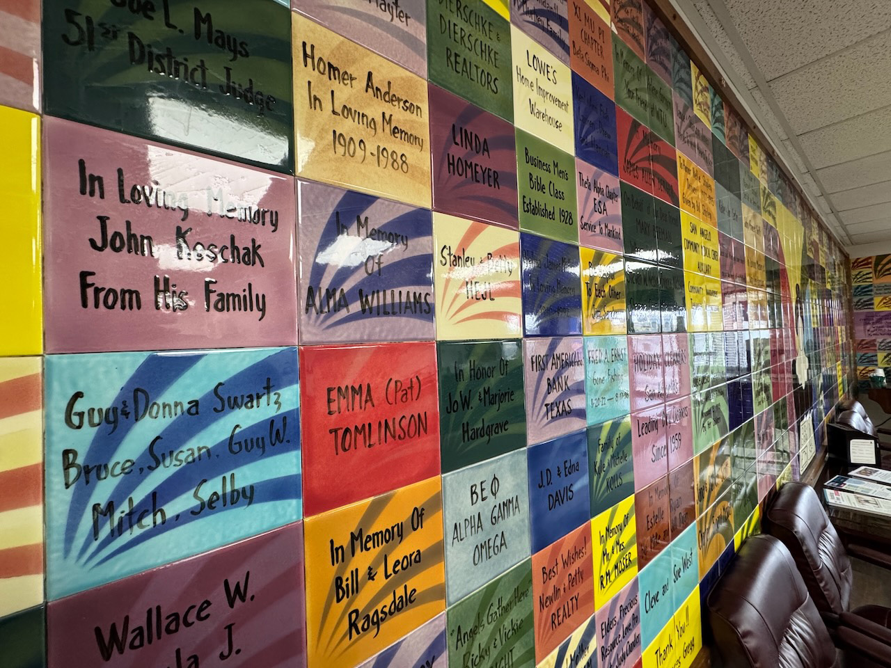 The wall of tiles honoring past and present donors and volunteers of Meals for the Elderly. The wall of tiles honoring past and present donors and volunteers of Meals for the Elderly.