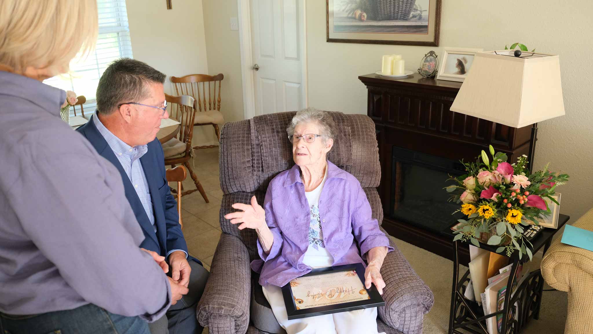 San Angelo Mayor Tom Thompson listens as Ida Walter shares stories from her life during her 101st birthday celebration on Friday. San Angelo Mayor Tom Thompson listens as Ida Walter shares stories from her life during her 101st birthday celebration on Friday.