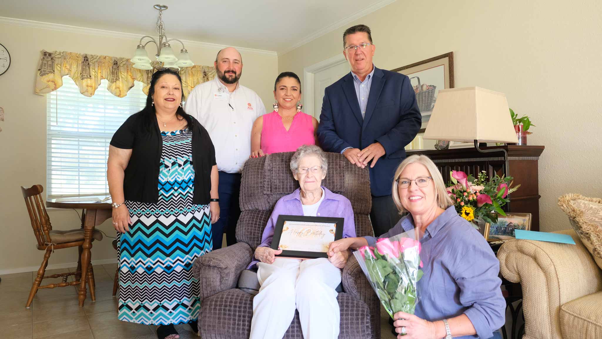 From left, Norma Dietz Lee, executive director of Meals for the Elderly; Lane Strickland, vice president; Suzannah Valenzuela, director of marketing; San Angelo Mayor Tom Thompson; seated, honoree Ida Walter; and kneeling, Karla Thompson, gather Friday to celebrate Walter’s 101st birthday. From left, Norma Dietz Lee, executive director of Meals for the Elderly; Lane Strickland, vice president; Suzannah Valenzuela, director of marketing; San Angelo Mayor Tom Thompson; seated, honoree Ida Walter; and kneeling, Karla Thompson, gather Friday to celebrate Walter’s 101st birthday.