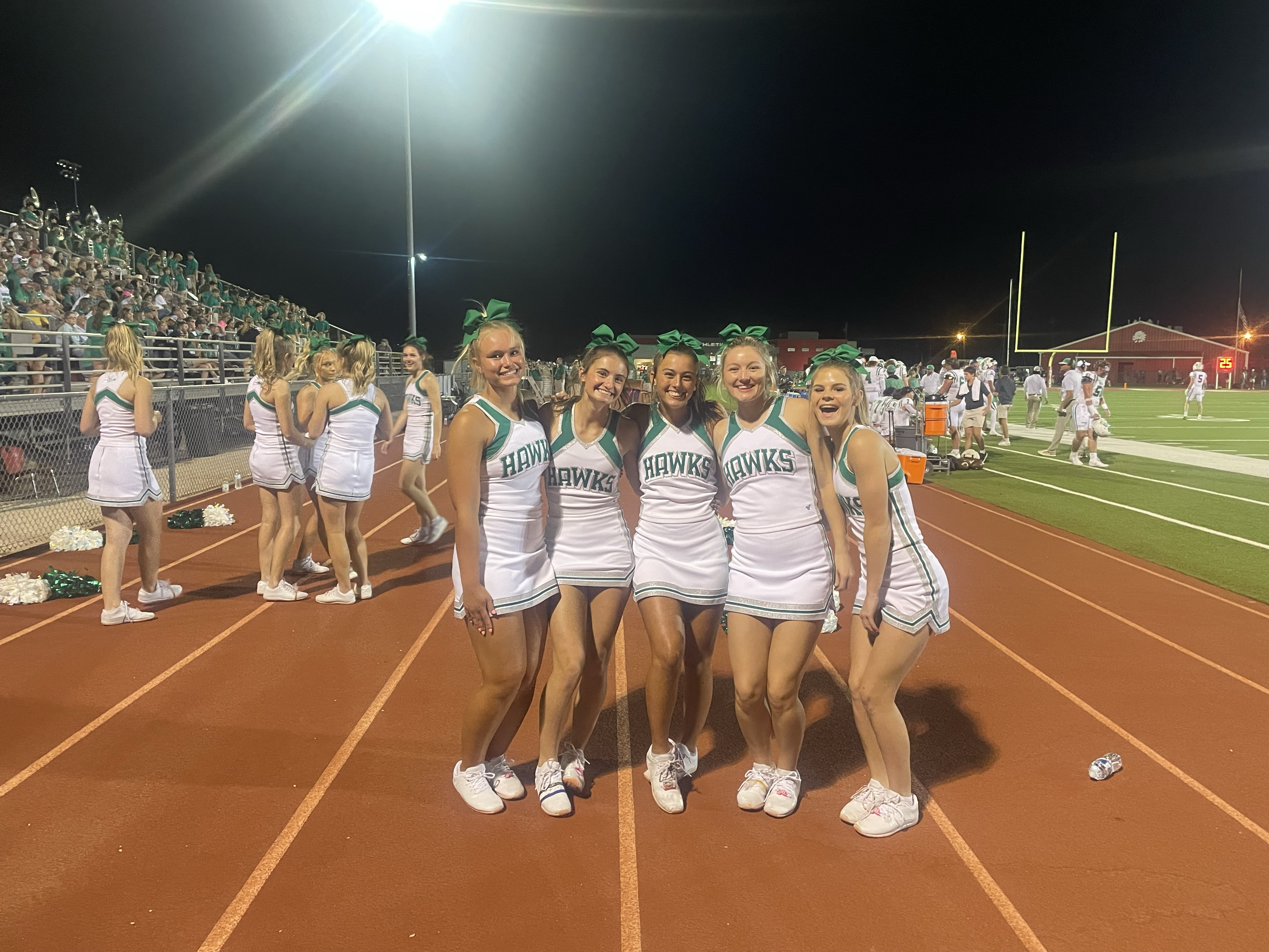 Wall High School cheerleaders are all smiles during the Hawks' 24-0 win over Jim Ned in Tuscola on Friday, Sept. 12, 2025. Wall High School cheerleaders are all smiles during the Hawks' 24-0 win over Jim Ned in Tuscola on Friday, Sept. 12, 2025.