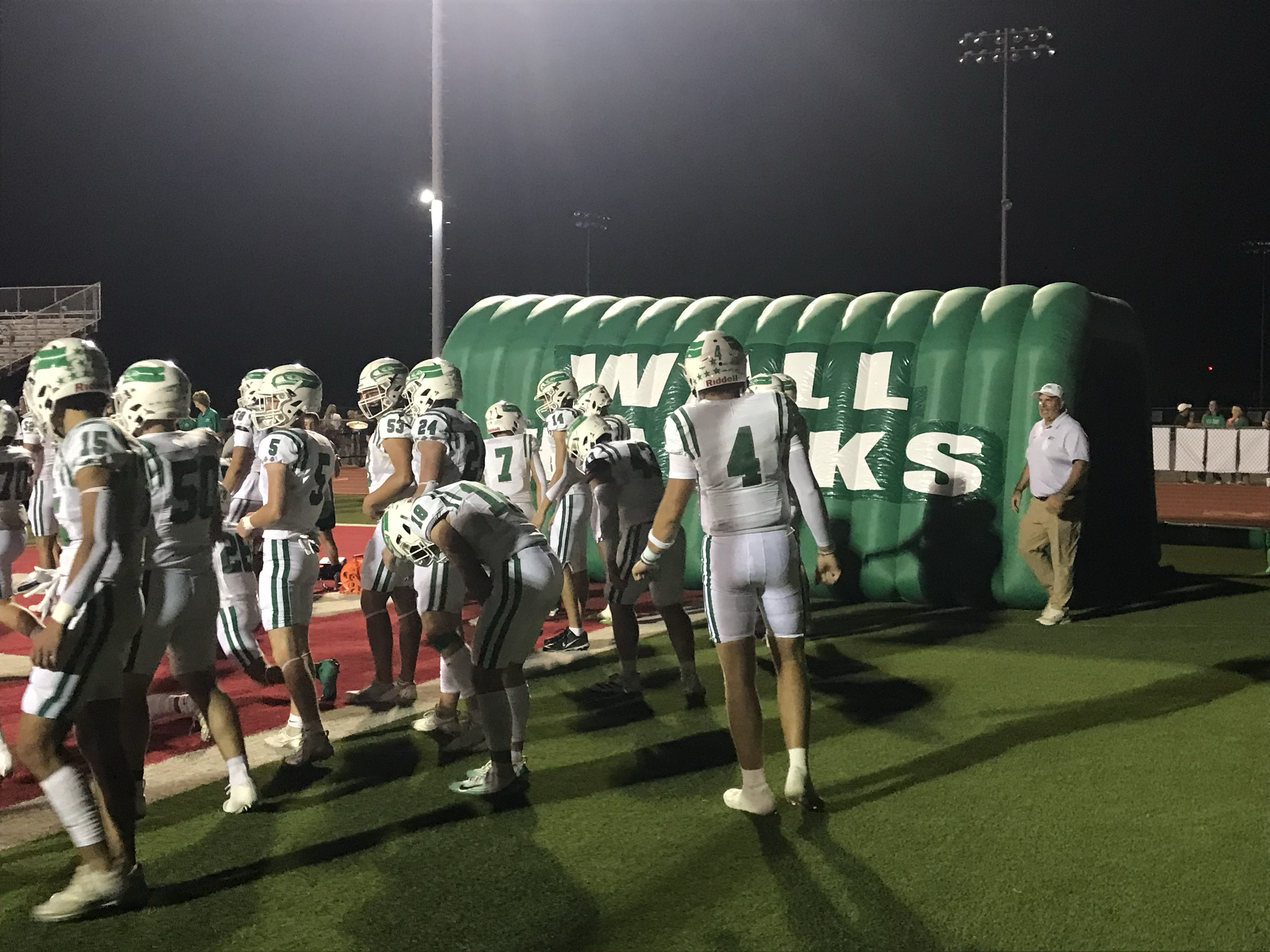 Quarterback Landon York (4) and the Wall Hawks warm up at halftime of their game with Jim Ned on Friday, Sept. 12, 2025, in Tuscola. Quarterback Landon York (4) and the Wall Hawks warm up at halftime of their game with Jim Ned on Friday, Sept. 12, 2025, in Tuscola.