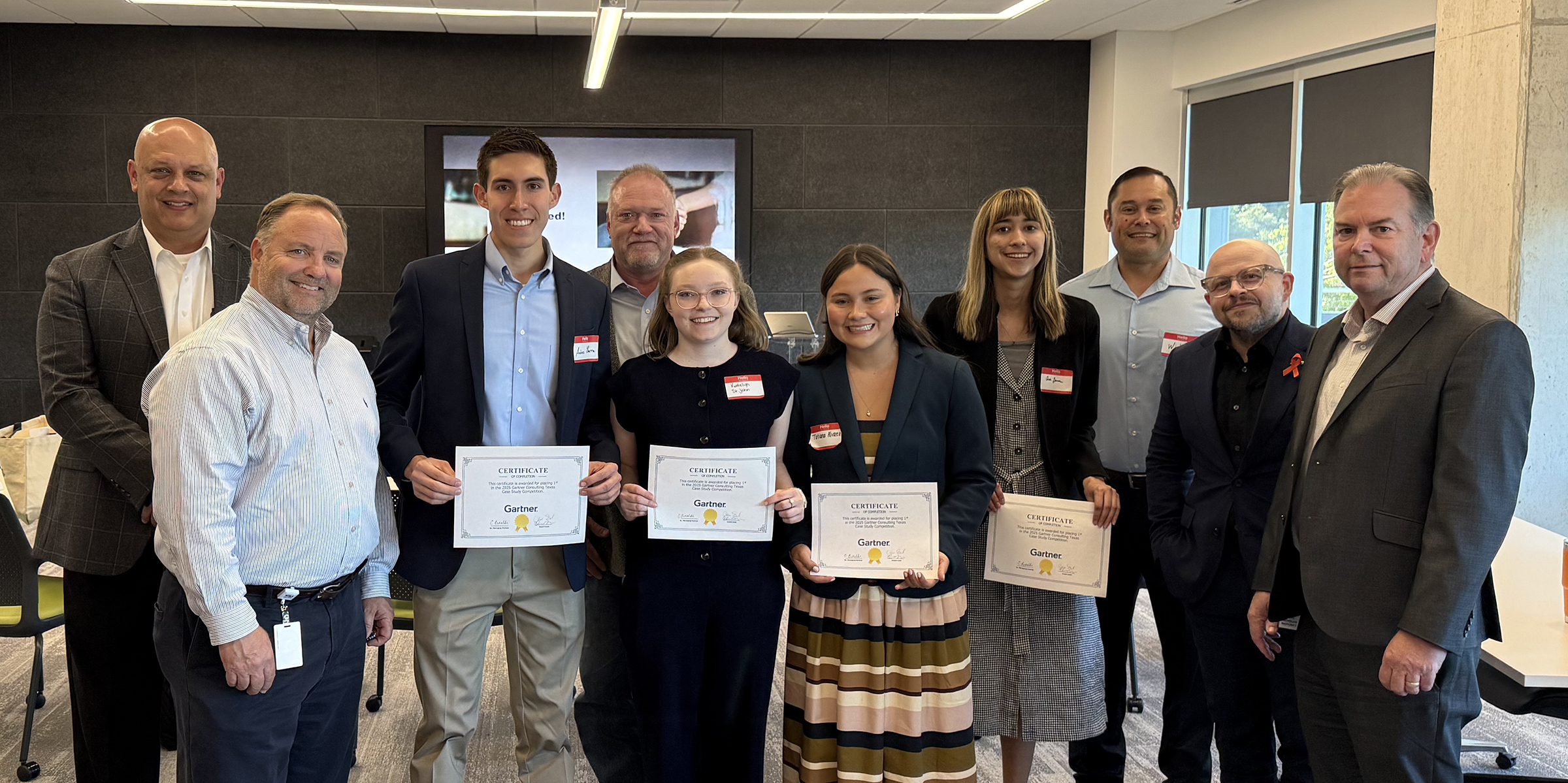 ASU Team (with certificates, L-R) Andres Ybarra, Katelyn St. John, Tatiana Alvarez and Ava James; Dr. Jeremy St. John (back row middle) and the contest judges. 