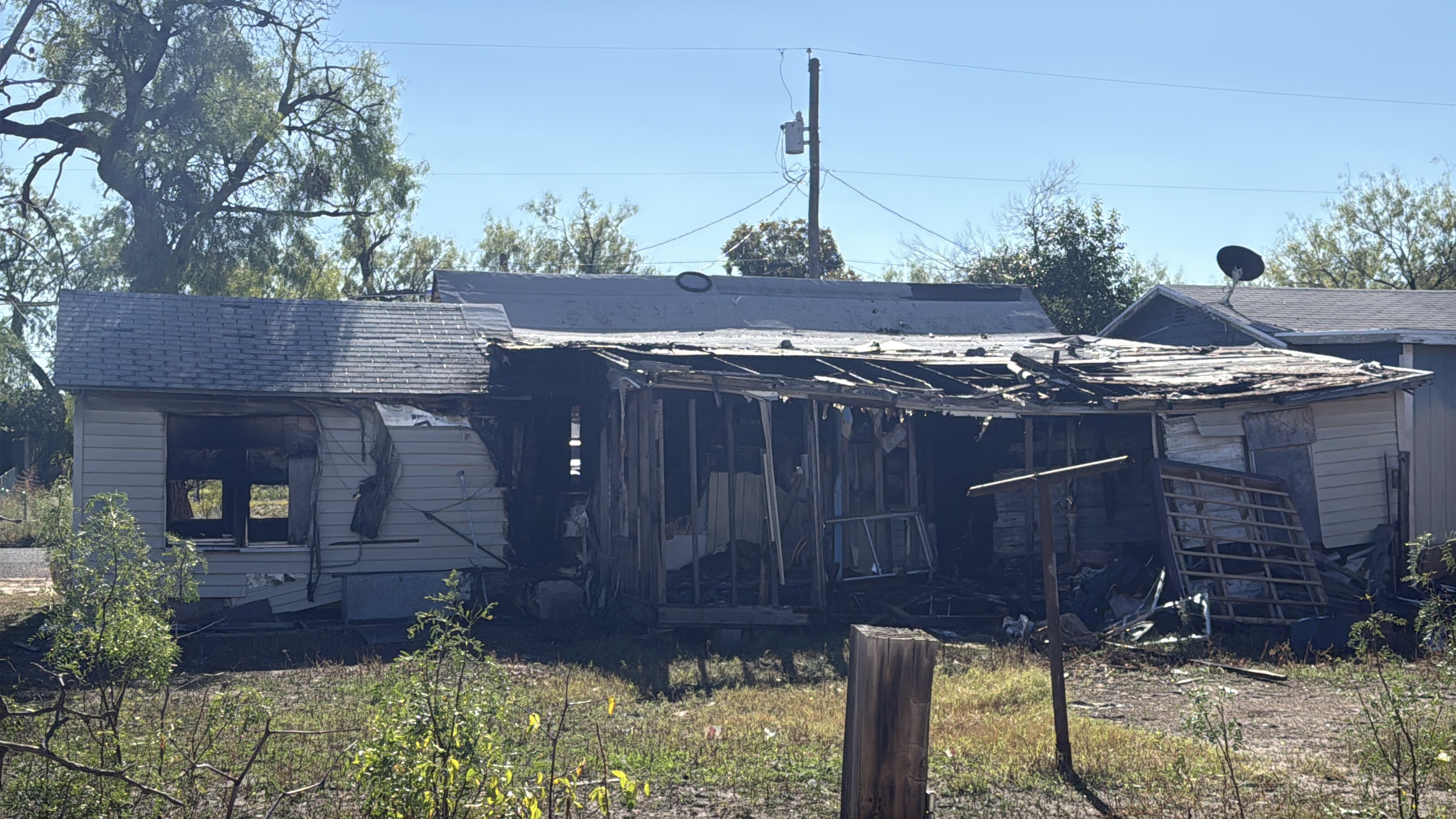 A shot from the backside of the house shows extensive damage after a strucure fire was called on Nov. 20, 2025. 