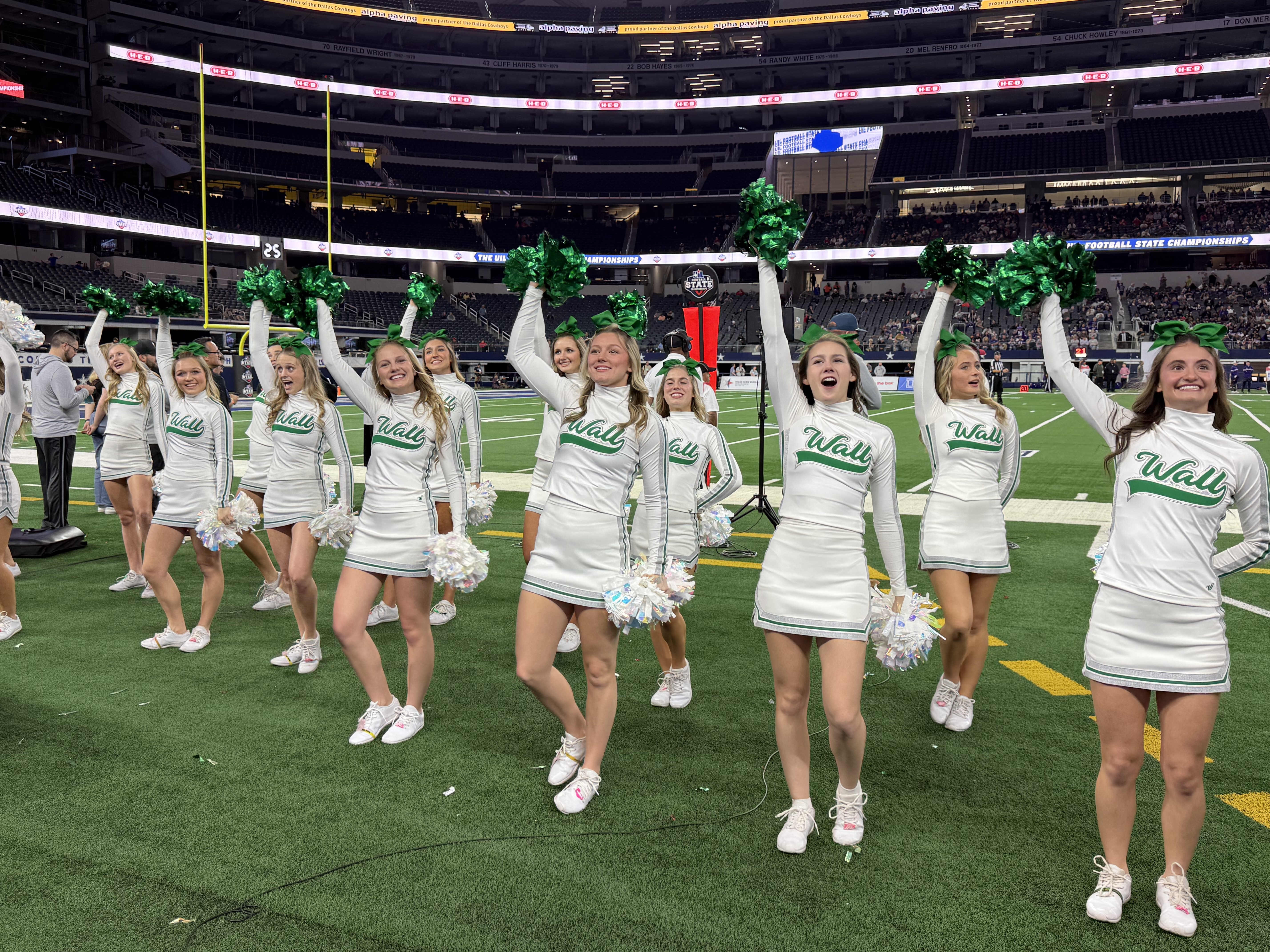 The Wall cheerleaders pump up the crowd during the Class 3A Division II state final Thursday, Dec. 18, 2025.