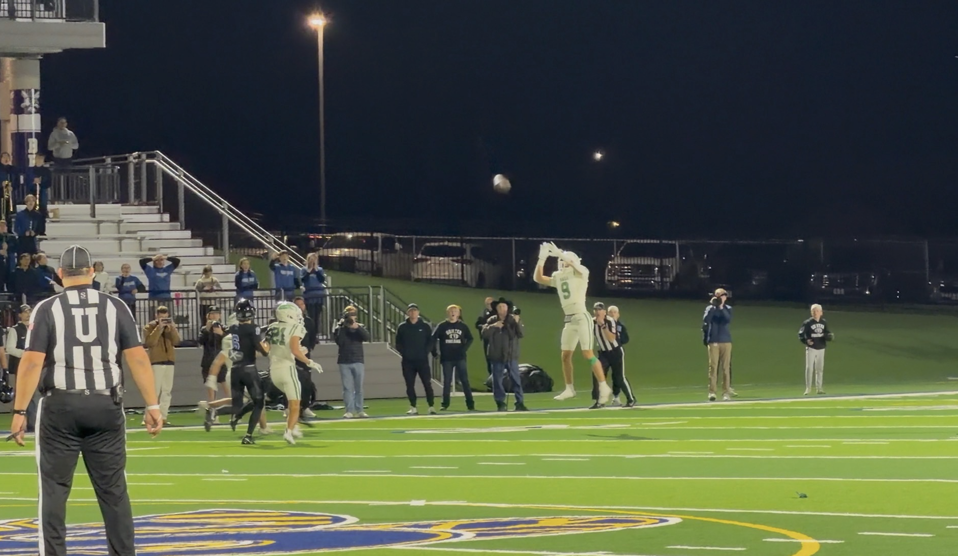 Wall Hawk's Gunner King bats down a pass in the State Semifinal