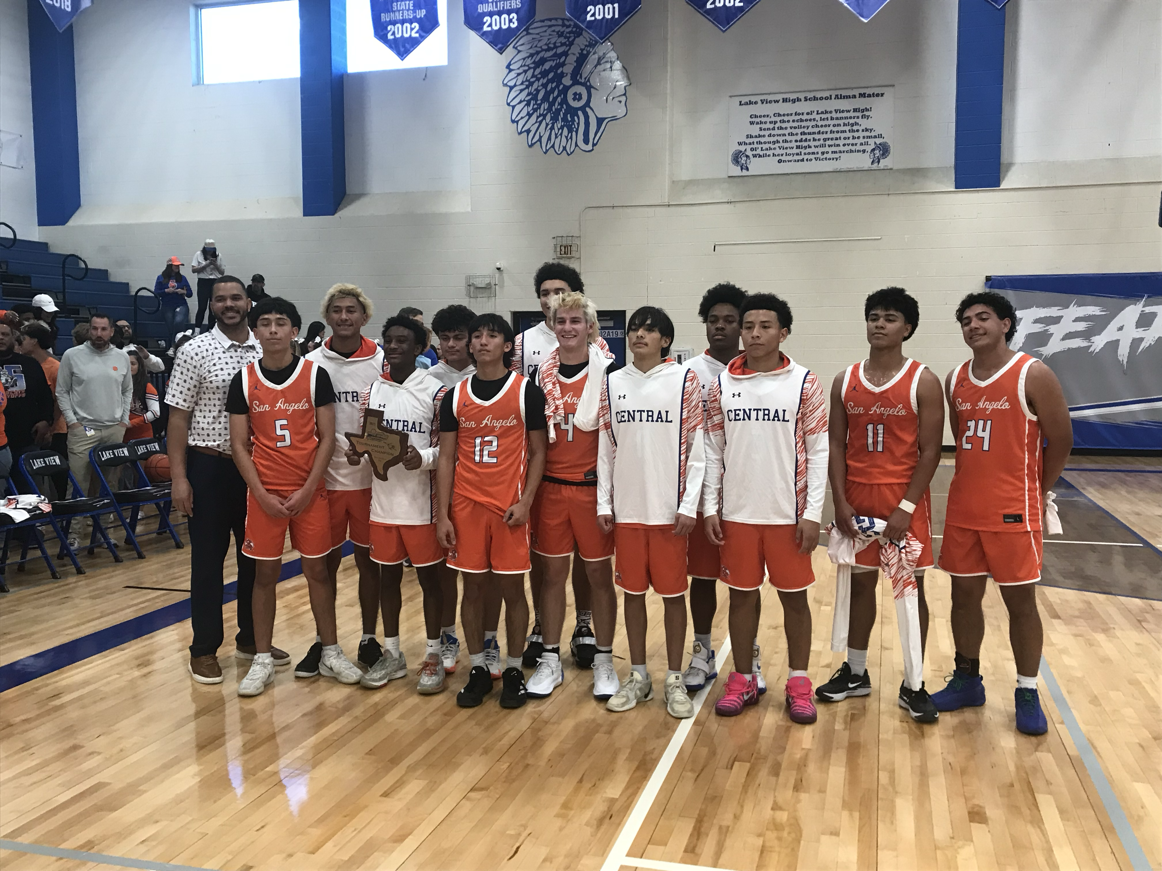 The Central Bobcats pose with the first-place trophy after defeating Lake View 74-39 ton win the Doug McCutchen Tournament title Saturday, Dec. 6, 2025.