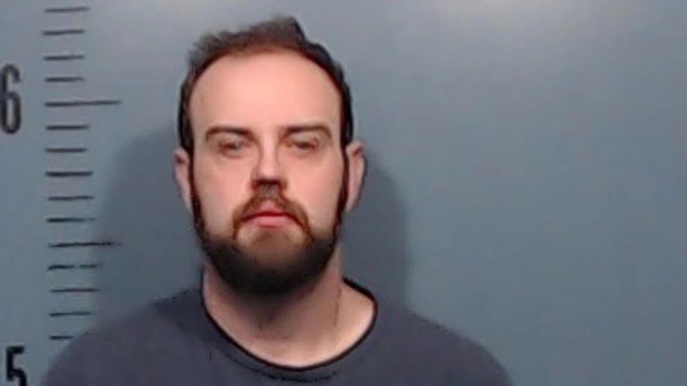 Lance Mosley, the band director at Mann STEAM Academy, was arrested Thursday and charged with possession of child pornography.