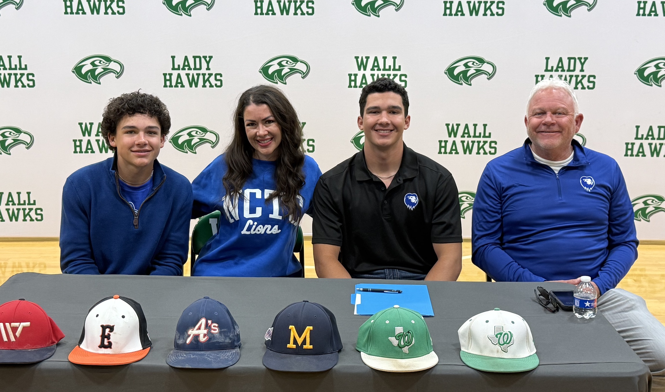 Wall Hawks' Gage Reichenau and his family at his signing day at Wall High School