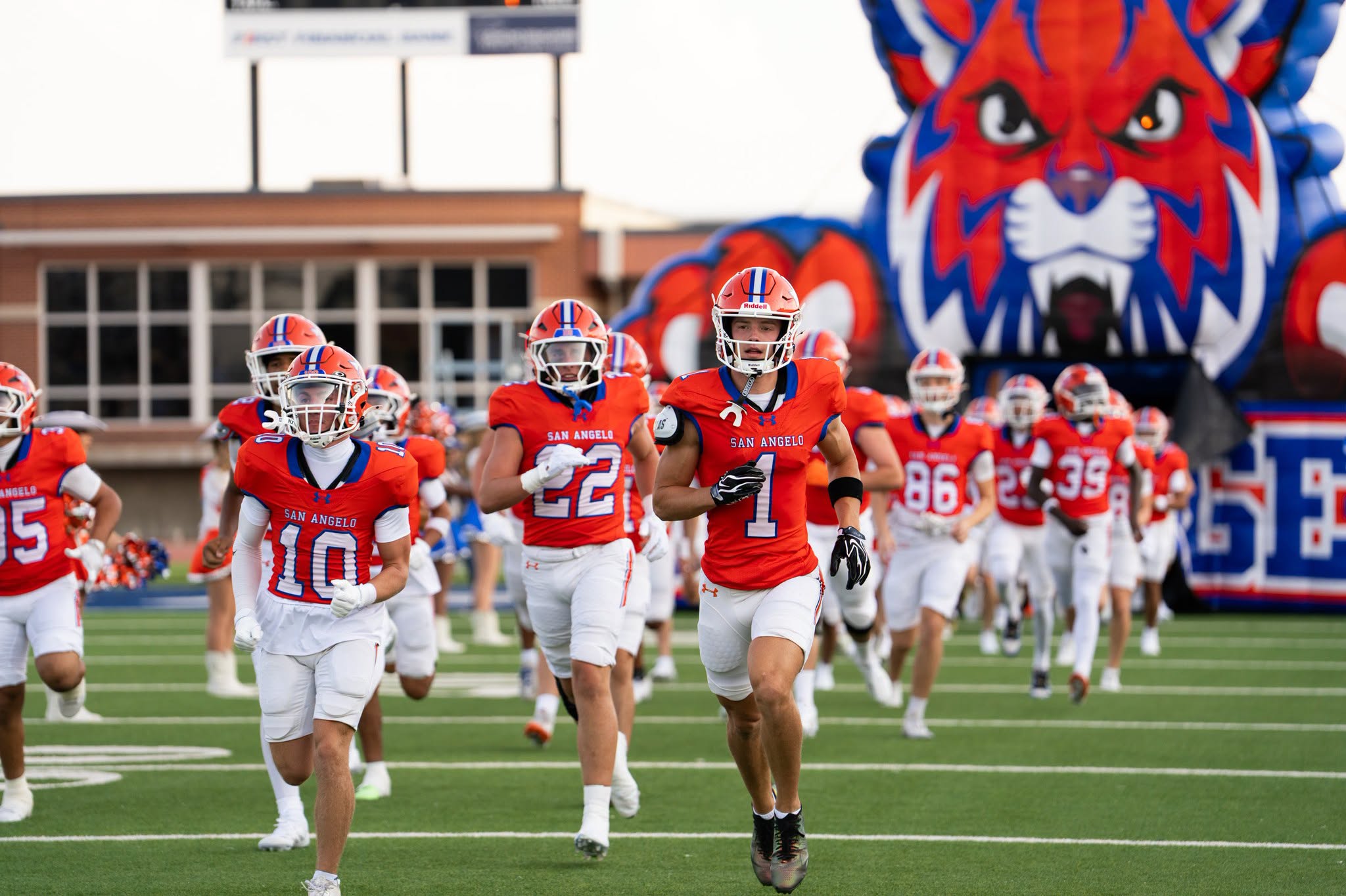 The Central Bobcats run onto the field before their game against Abilene High on Friday, Aug. 28, 2026.